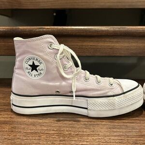 Light purple converse.